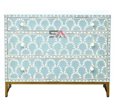 a blue and white dresser with two drawers