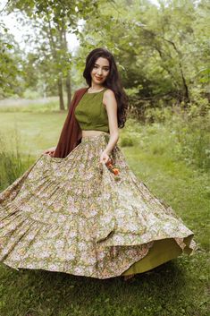 This exquisite printed tiered chaniya with 10 to 12 meter flare, lavishly decorated with a pattern throughout, a delicate blouse with embroidery, and a dupatta with embroidered butta, presents an extraordinary selection for momentous occasions! Luxurious cotton fabrics wrap your silhouette with effortless poise, captivating all spectators. Ideal for remarkable events, this refined ensemble is sure to elicit awe and respect. Kurta Ideas, Lehenga Top, Taurus Women, Designer Suit, Baby Frocks Designs, Indian Clothes, Chaniya Choli, Lehenga Designs