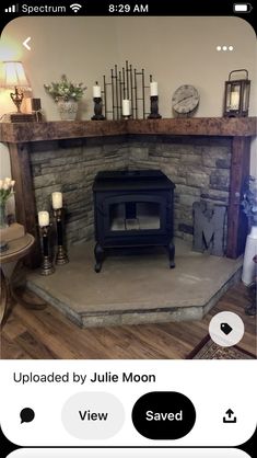 an image of a fireplace with candles on it