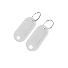 two white tags are hanging from the side of each other on a keychain