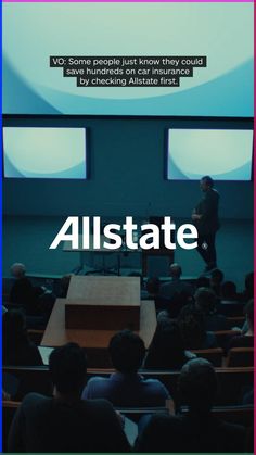 a man standing on top of a podium in front of an audience with the words allstate above it