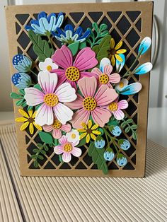 a close up of a card with flowers on it