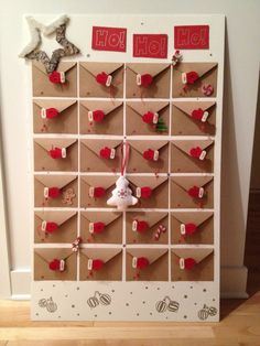 an ornament is hanging on the wall next to a bulletin board with christmas decorations