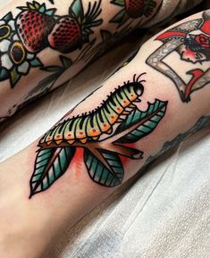 two tattoos on both legs with different designs