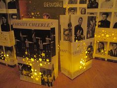 several boxes with pictures on them and lights in the shape of stars