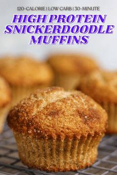 a close up of a muffin on a cooling rack with the words high protein snickkerdoodlele muffins