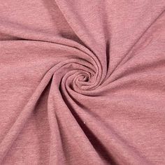 a close up shot of a pink fabric