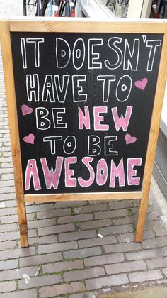 a sign that says it doesn't have to be new to be awesome