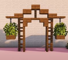 a set of wooden structures with plants hanging from the top and two potted plants on each side