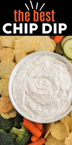 a bowl of dip surrounded by vegetables and crackers with the words sour cream chip dip above it