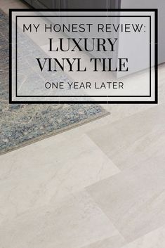 a white tile floor with the words my honest review luxury vinyl tile one year later