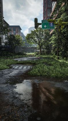 a street sign on the side of a road in front of tall buildings and trees