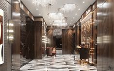 an elegant hallway with chandeliers and marble flooring is pictured in this rendering