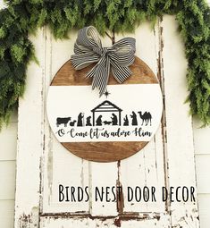 a sign that says birds nest door decor