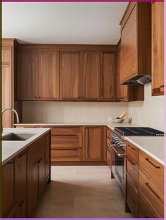 a kitchen with wooden cabinets and white counter tops