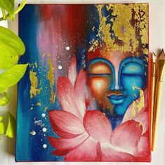 a painting on a canvas with a flower and buddha's face in the center