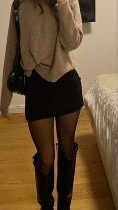 Cute black mini skirt for fall and winter holiday outfits Flirty Fall Outfits, Mini Skirt And Sweater Outfit, Black Skirt Winter, Mini Skirt Outfit Fall, Black Skirt Outfit Winter, Mini Skirt Fall Outfit, Mini Skirt Outfit Winter, Winter Mini Skirts, Fall Fashion Boots