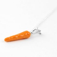 Choker necklace with a silver Carrot shaped charm. The silver vegetable has been enamel, with a orange color.SIZE➤ The silver chain length is 40cm or 45cm (stretched) you can choose one of the two lenght options.Dimensions of the half orange: Dimensions 30x5mmCOLLECTION➤ The design belong to the collection " Joyas Sabrosas" (Tasty Jewels)If you have any questions, please contact me. I will be very happy to help you.NOTE➤ All our designs are handmade, the color may be slightly different from one Carrot Jewelry, Vegetable Jewelry, Orange Necklace, Golden Necklace, Dainty Pendant, Golden Ring, Silver Choker, Chain Silver, Pink Earrings