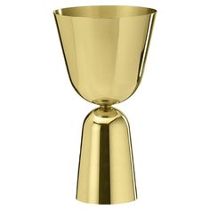 a gold colored cup on a white background