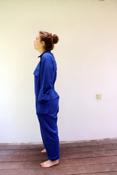 "Vintage blue chore coveralls from Israeli flight school printed in Hebrew on the back and front...\" Amal Ramat David Building the future\" with an F16 airplane drawing on the back panel, pockets with velcro opening, zips down the front, elastic waist on the back, soft cotton. an oversize and loose fit can be worn by both men and women. aside from minor signs of wear...The back hem of the pants is worn, otherwise, good vintage condition clean ready to wear. **Model is 5'8\" and a size s/m for r Blue Fitted Utility Jumpsuits And Rompers, Blue Fitted Utility Jumpsuit, Blue Denim Jumpsuit With Side Pockets, Retro Workwear Jumpsuits And Rompers, Retro Style Workwear Overalls And Rompers, Blue Overalls With Pockets, Vintage Blue Long Sleeve Overalls, Blue Relaxed Fit Utility Jumpsuit Or Romper, Blue Utility Jumpsuits And Rompers With Relaxed Fit