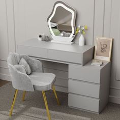 a gray desk with a chair and mirror