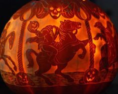 a carved pumpkin with an image of a horse and rider on it's back