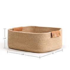 a large basket with leather handles on the bottom and side, measurements for each item