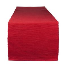 a red table runner with pleated edges on the top and bottom, set against a white background