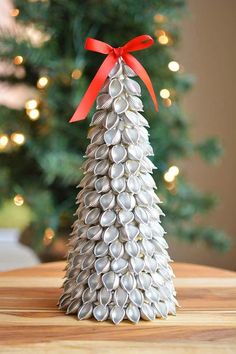 a bottle cap christmas tree on a table