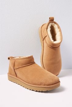 A modern take on the iconic silhouette, the UGG® Ultra Mini boot features a low shaft height for easy on-and-off and a soft sheepskin exterior that's been pre-treated to protect against water. Finished with their signature plush lining, you'll be wearing them all season long. | UGG Women's Classic Ultra Mini Shoes, Size 9, Brown Ugg Classic Ultra Mini Boots, Micro Uggs, Ugh Mini, Ugg Minis, Ugg Ultra Mini Boots, Ultra Mini Ugg, Shoes Uggs, Ultra Mini Uggs, Mini Ugg Boots