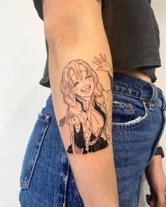 a person with a tattoo on their arm