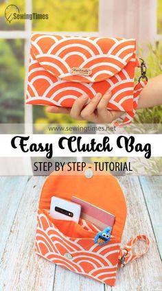 an orange and white purse with the words easy clutch bag written on it, in front of