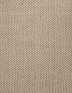 an upholstered area rug in beige and white with diamond pattern on the side