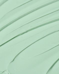 a close up view of some green paint