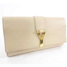 Ysl Beige Leather Y Ligne Clutch Bag. Smooth Calf Leather With Goldtone Metal Y Logo Clasp. Suede Lined Interior. Measures 11 X 6 X 1.75”. Excellent Exterior Condition. Lipgloss Blemish On Interior. Original Duster Bag Included. Yves Saint Laurent Wristlet, Yves Saint Laurent Bags, Calf Leather, Yves Saint Laurent, Clutch Bag, Saint Laurent, Gold Tones, Bag Lady, Leather