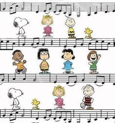 a group of people that are standing on a sheet of musical notes with the words charlie brown