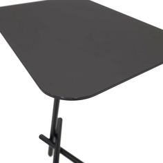 a black table with two metal legs and a square shaped top on it's side