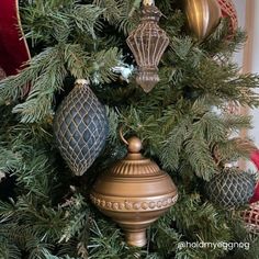 a christmas tree with ornaments hanging from it