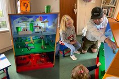 a man and two children playing with toys in a play room at the same time