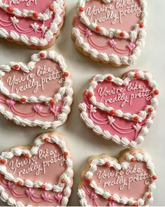 heart shaped cookies with writing on them that say, you're really pretty today