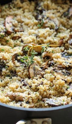 a pan filled with food sitting on top of a stove