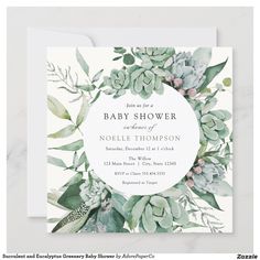 a baby shower with succulents and greenery in the center, on top of a white card