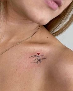 a woman with a tattoo on her chest