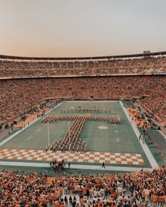 an orange and white checkered football field