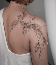 a woman with a tattoo on her back