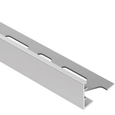 a metal strip with two holes in the middle and one hole at the bottom, on a white background