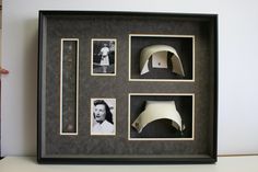 a shadow box with some pictures in it