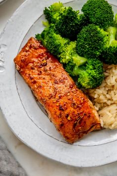 salmon, rice and broccoli on a plate with the words easy balsamic salmon