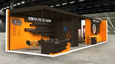 an exhibition booth with orange and black walls