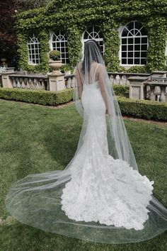 Striking in its simplicity, the Calla Lily veil is a sheer minimalist veil with a wide train that epitomises clean and contemporary elegance. Classic, cool and featuring a fuss-free aesthetic, this is a veil for modern romantics who want to showcase the back of their wedding dress while also wearing a strikingly beautiful long veil.Available in soft ivory or bridal white tones. Please leave your colour preference in the message box at checkout.• DETAILS •> Designed and handmade in Australia. Diamond White Wedding Dress, Minimalist Veil, Wedding Veil Cathedral, Floral Bridal Comb, Ivory Wedding Veils, Ivory Wedding Gown, Bridal Hair Combs Pearl, Veil Cathedral, Cathedral Wedding Veils